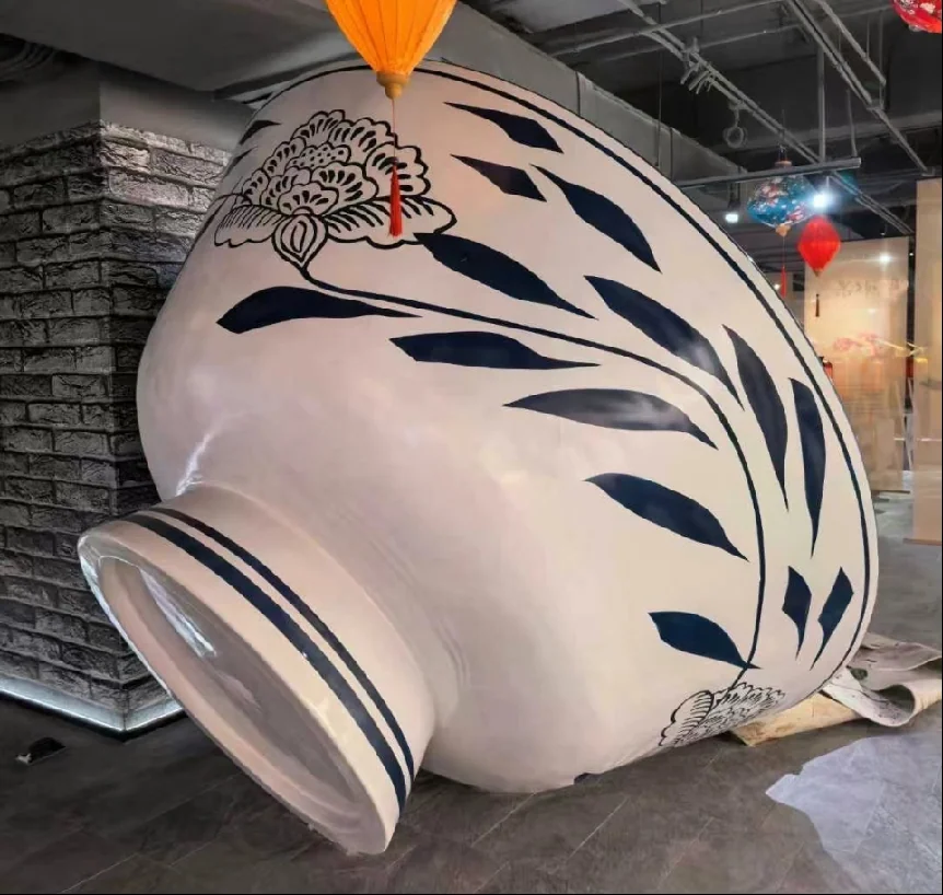 Themed vessel-like exhibition prop photographed during production